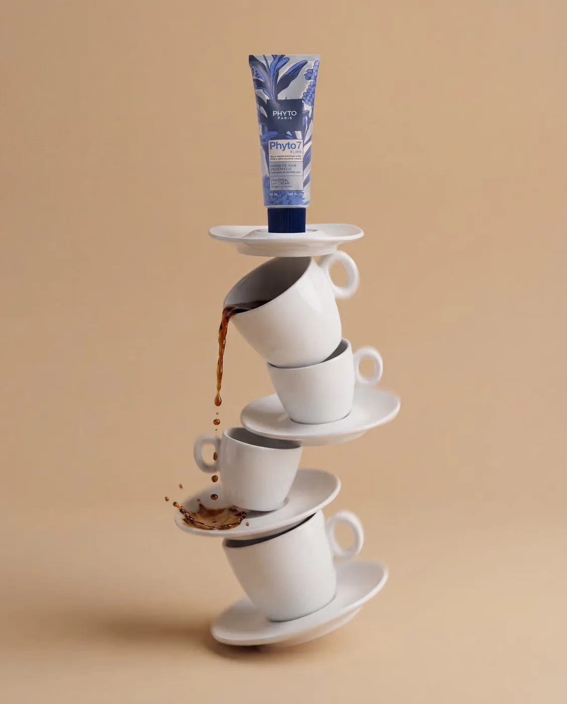 Stacked espresso cups promotional visual